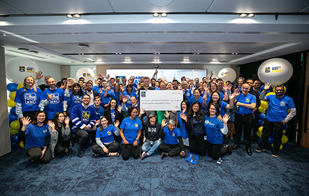 Collage Image Group photo of RBC employees indoors with charity representatives