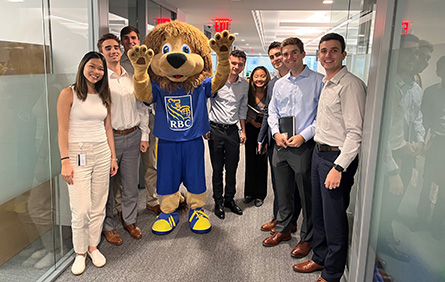 Collage Image RBC Lion with employees outside