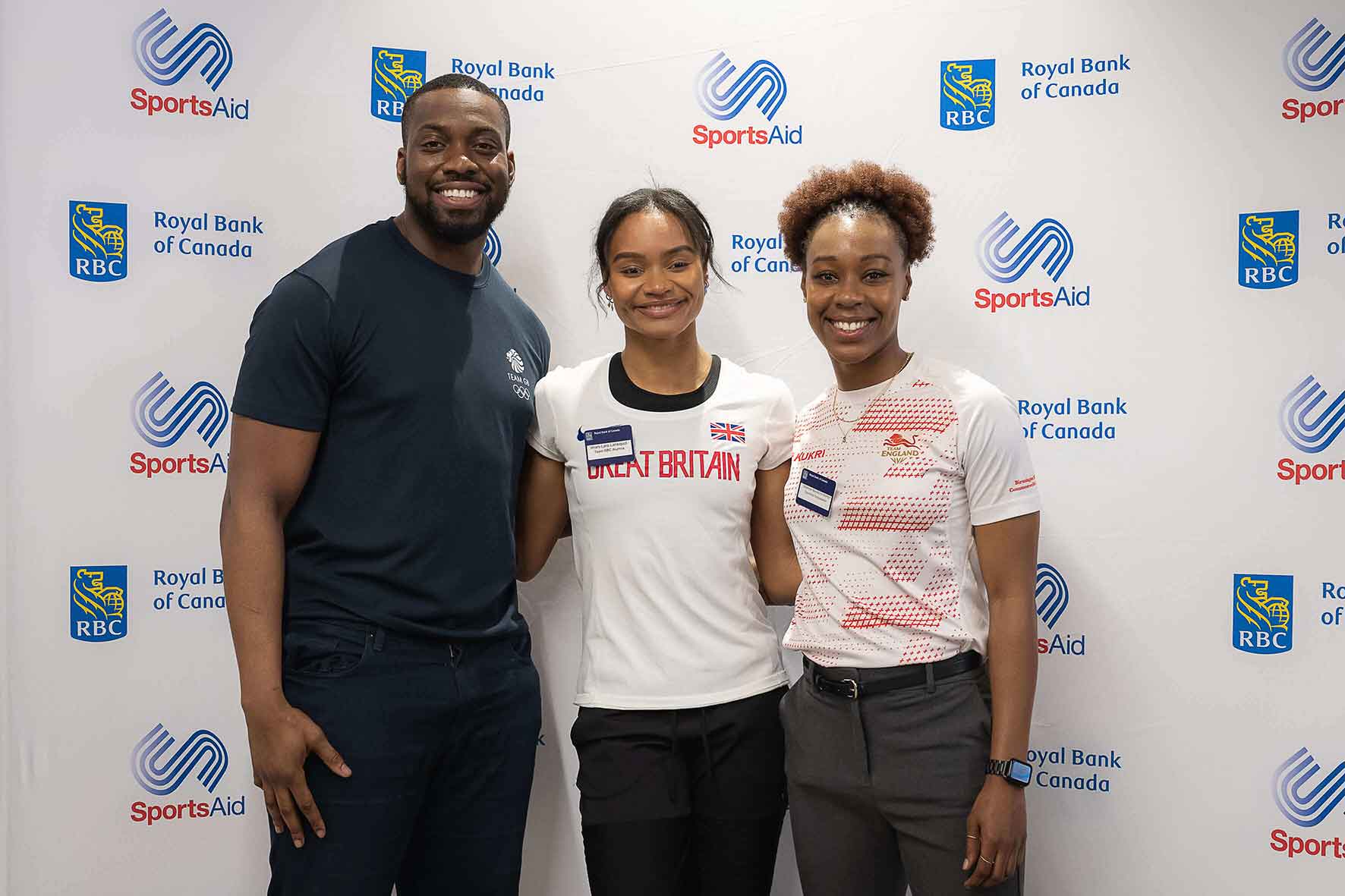 Imani-Lara (centre) with fellow SportsAid alumni Lutalo Muhammad (left) and Shanice Beckford-Norton (right)