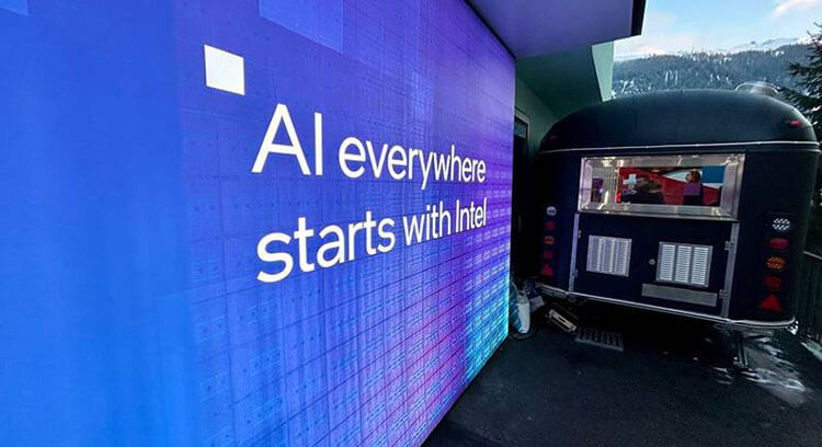 Image of Davos event - AI everywhere starts with Intel poster on wall