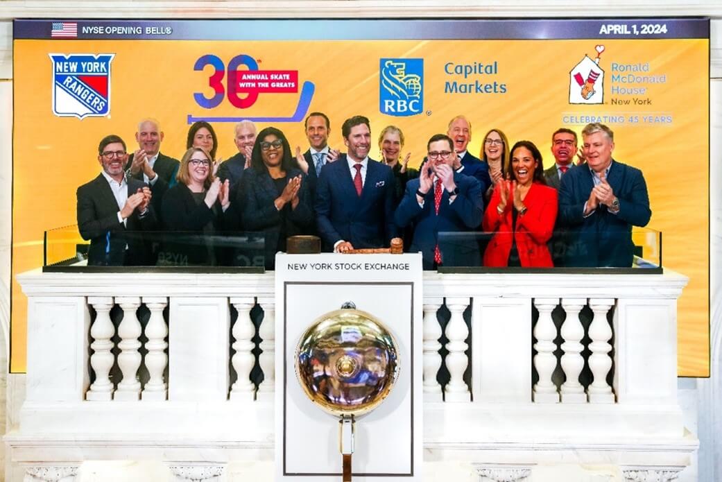 Image of Henrik Lundqvist and group ringing opening bell at the New York Stock Exchange